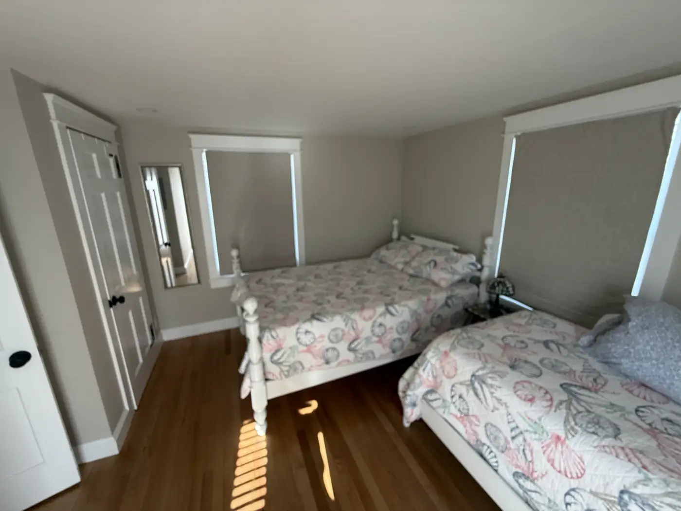 Bedroom showing closet and beds