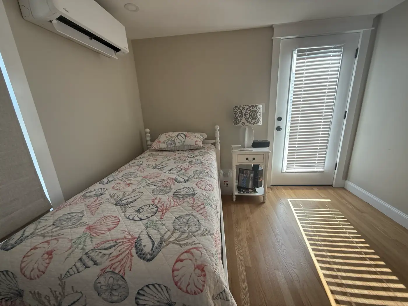 Single bed detail with door access